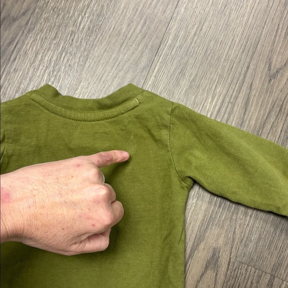 Set of three: (LtoR) 0-3mo Emporio Baby, 3mo Carhartt & 3mo Member’s Mark Onsies